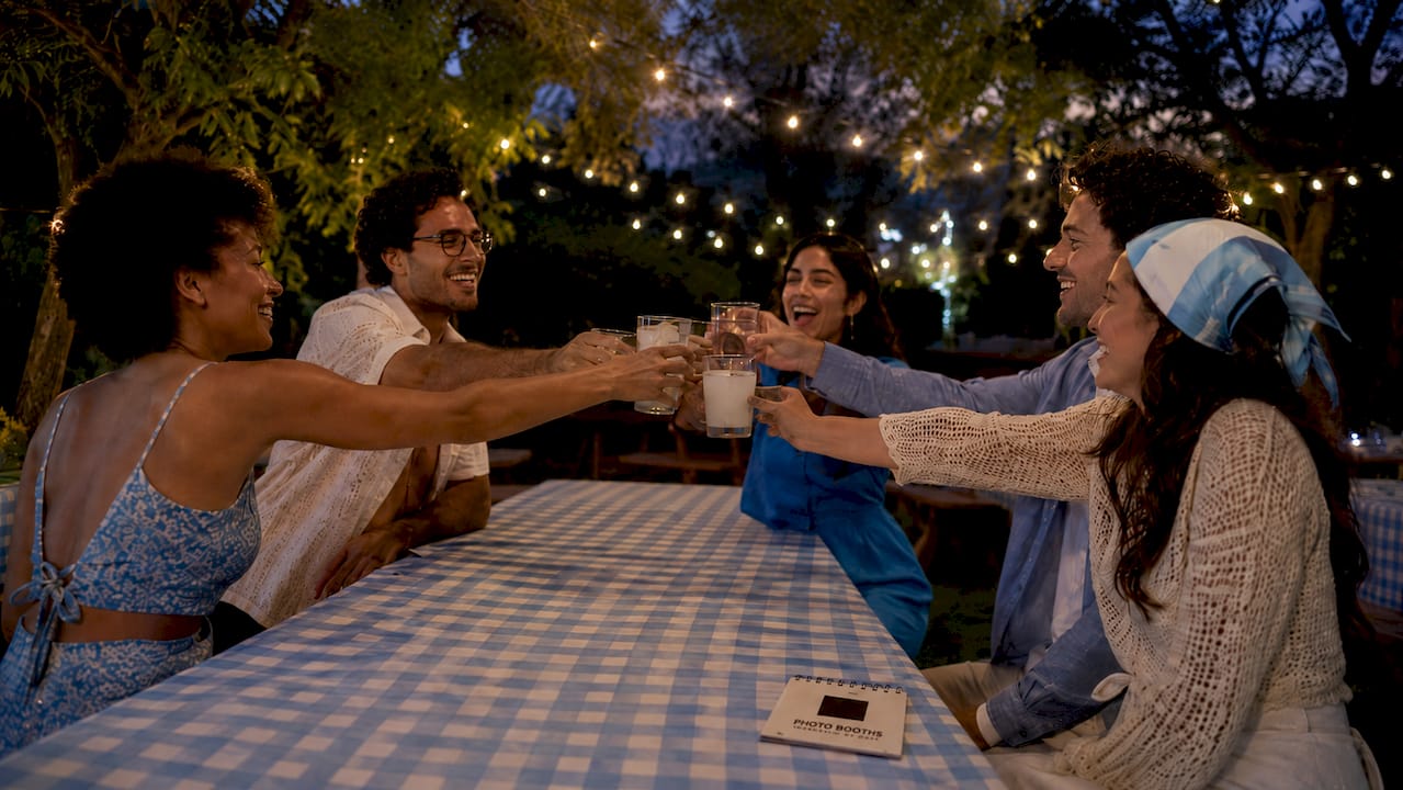 Guests celebrating cheerfully at indoor party